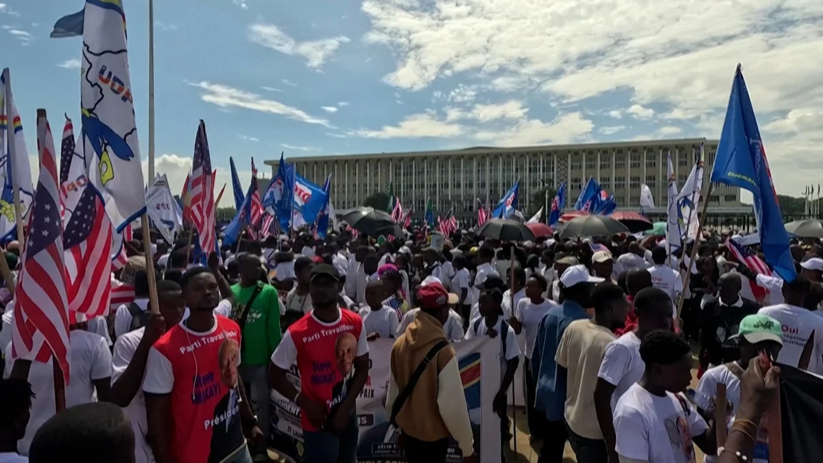 Pro-Government Protesters Torch Kabila-Linked Headquarters Amidst Calls for US Sanctions Over Alleged Rebel Support in Democratic Republic of Congo.